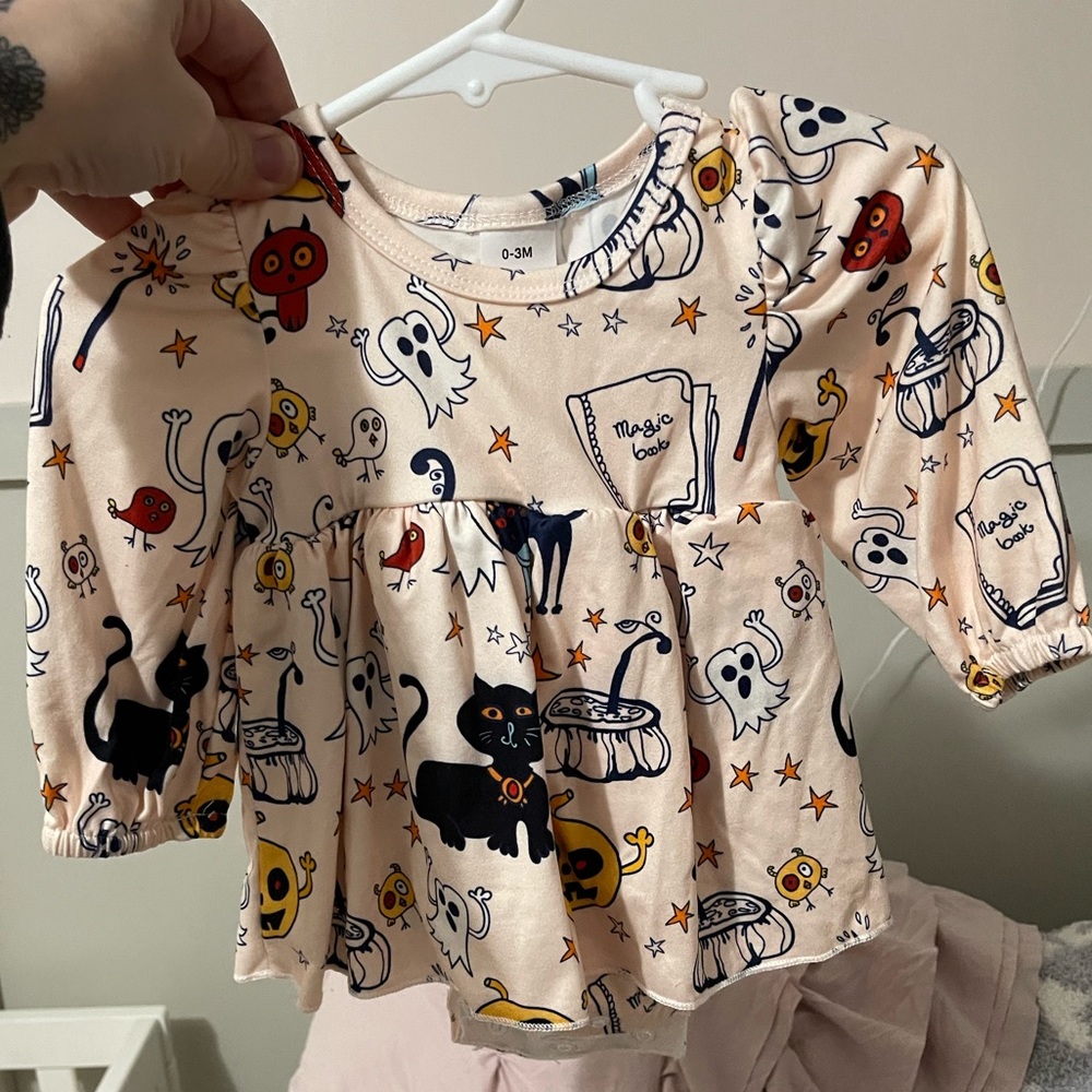 0-3 Halloween twirl.